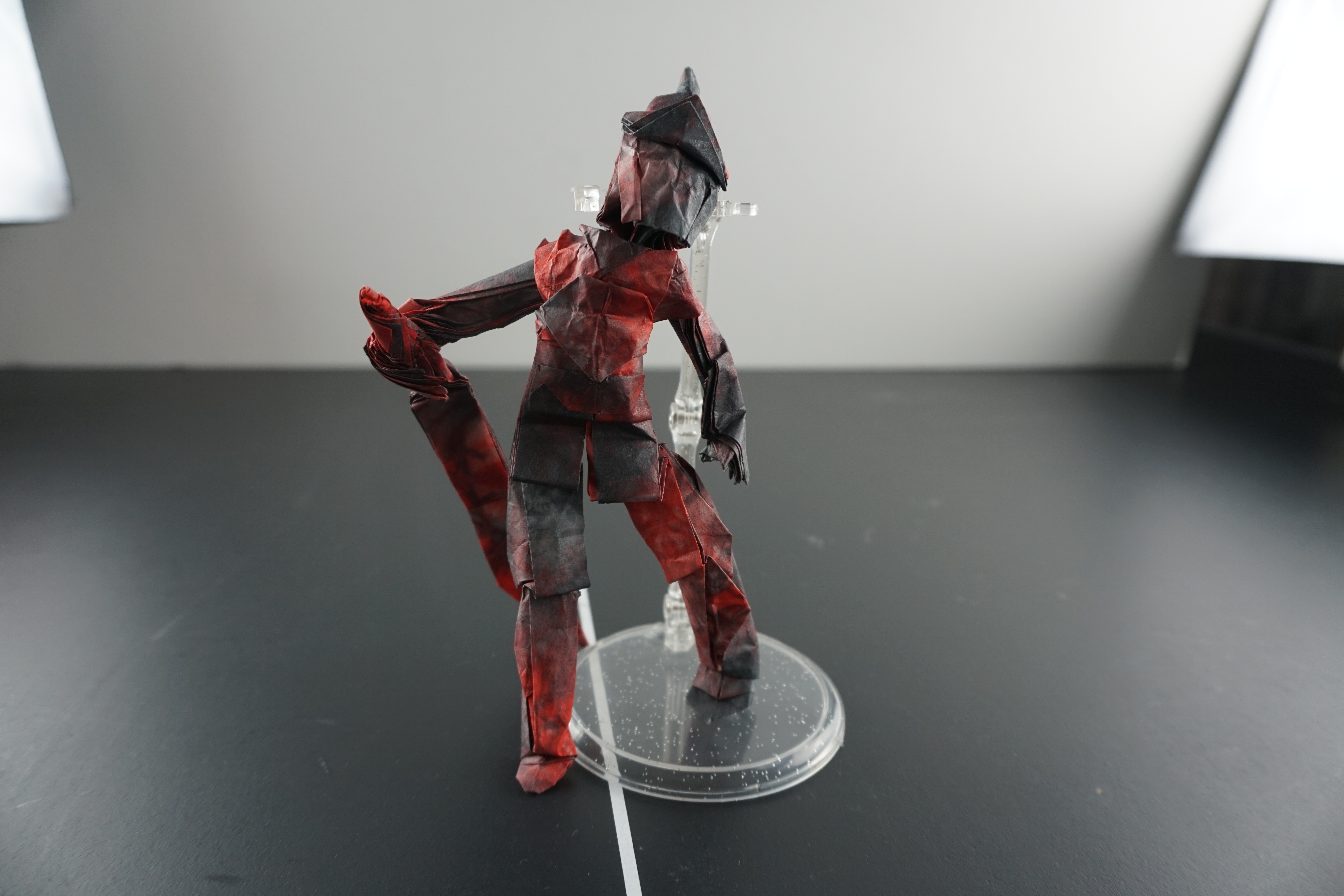 Red and black armored warrior figure
